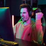 medium-shot-victorious-gamer-desk (1)